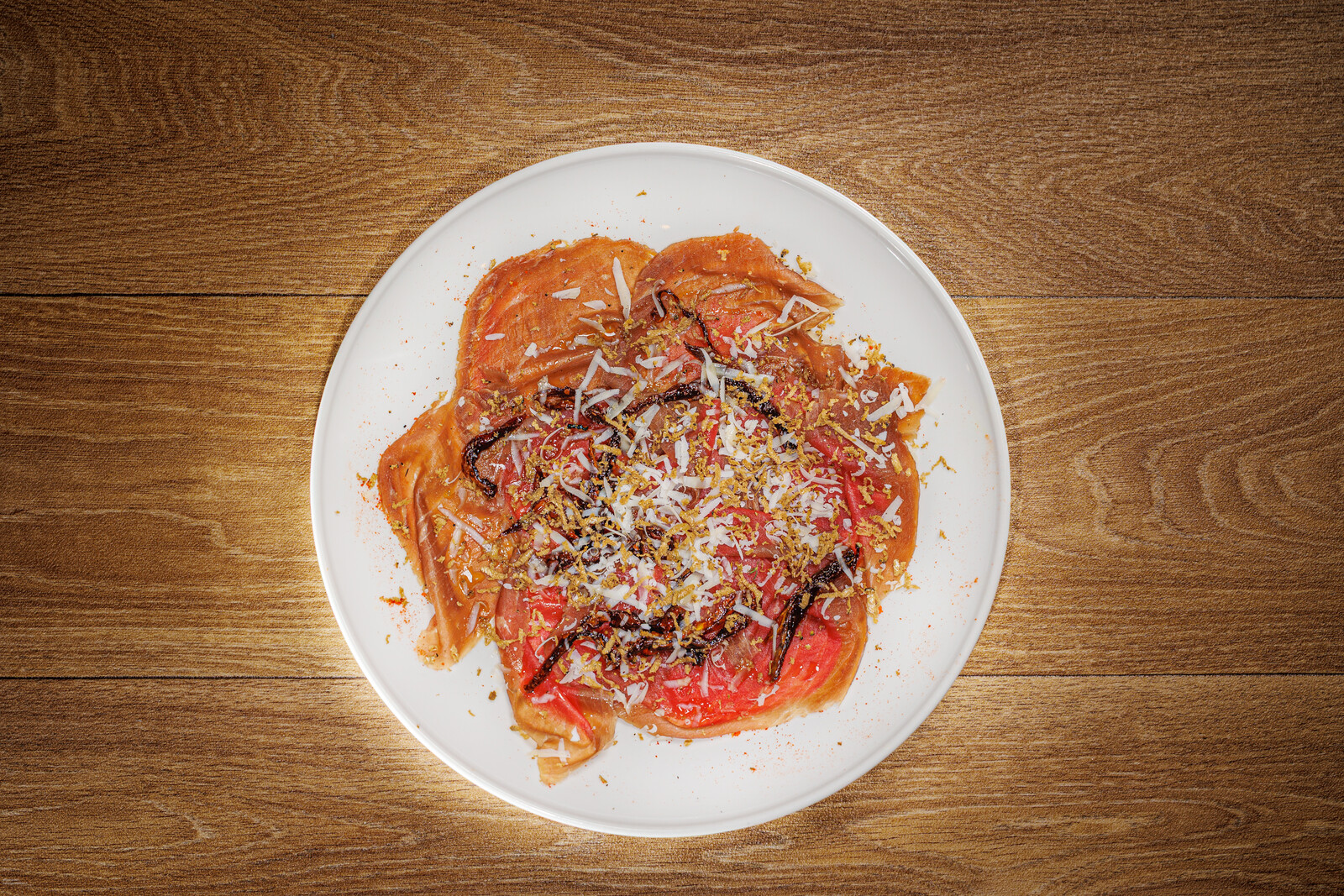 Carpaccio di Angus — Con tartufo nero irpino, pomodori secchi e caciocavallo