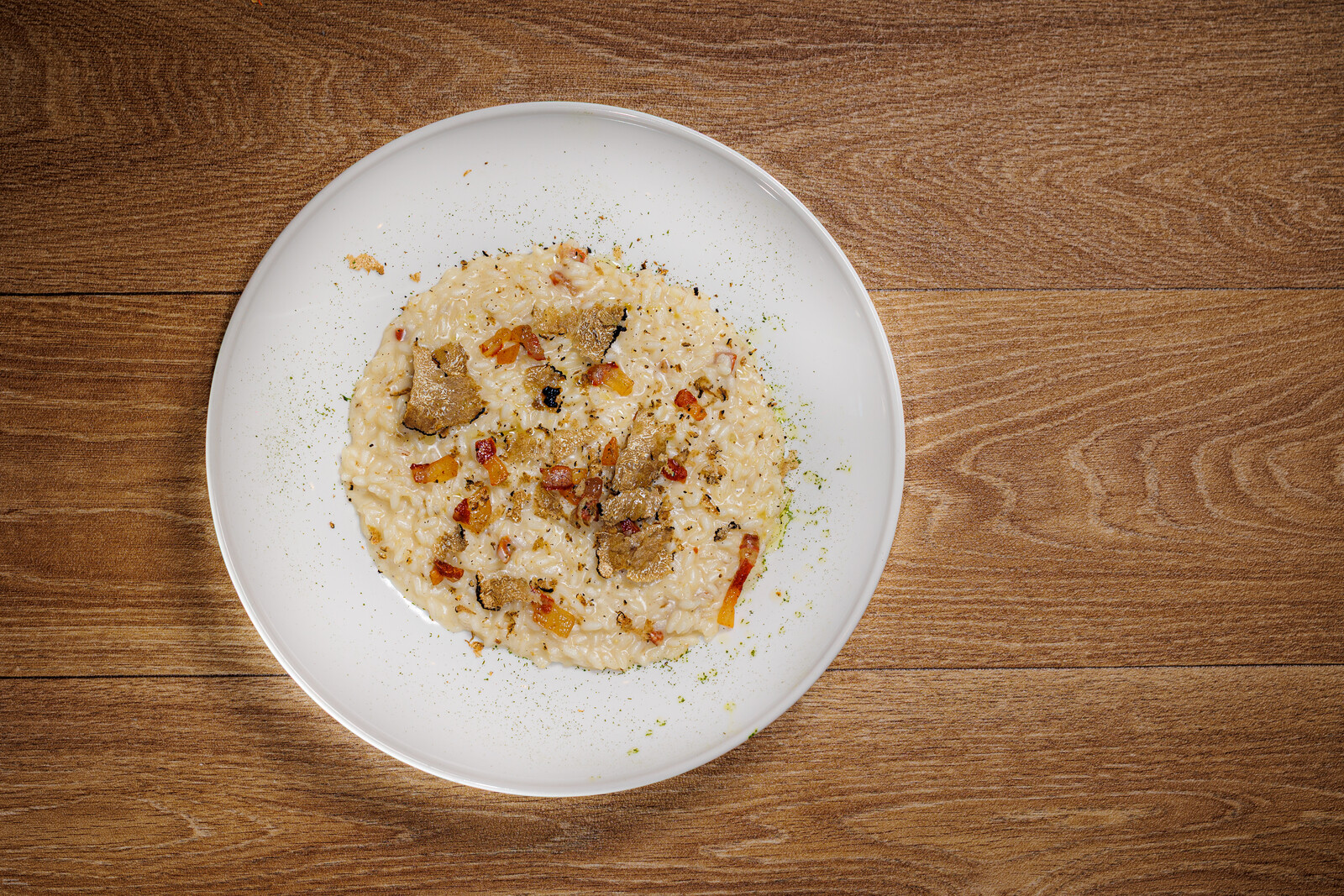 Risotto al tartufo — Riso Carnaroli selezione La Balocchina al tartufo nero, pancetta di Mora Beneventana tostata